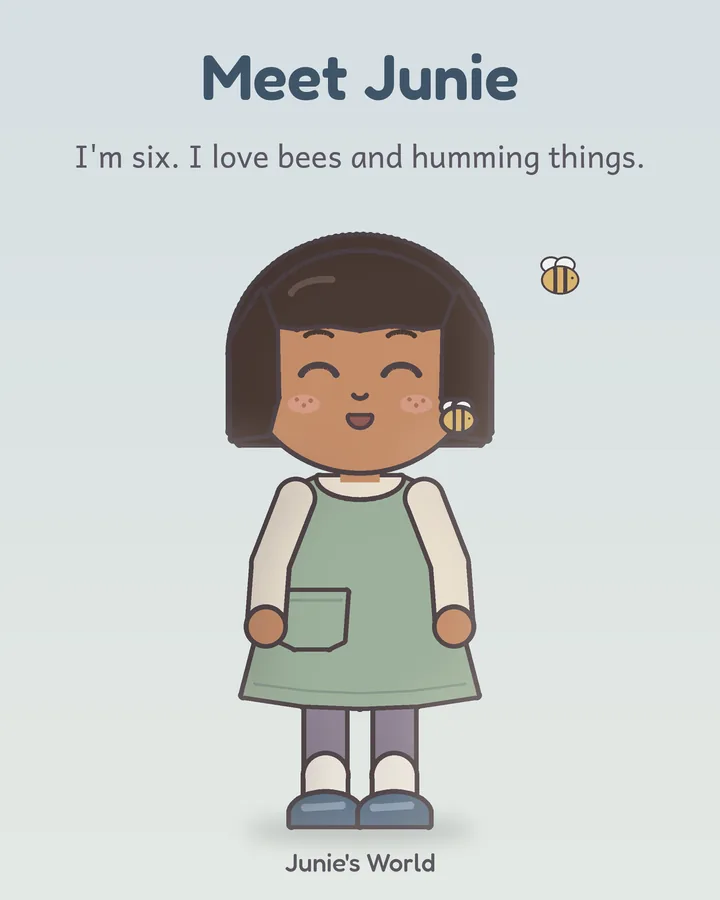 Junie giggles with her hat off, showing her bumblebee hair clip. A small bee floats nearby.
